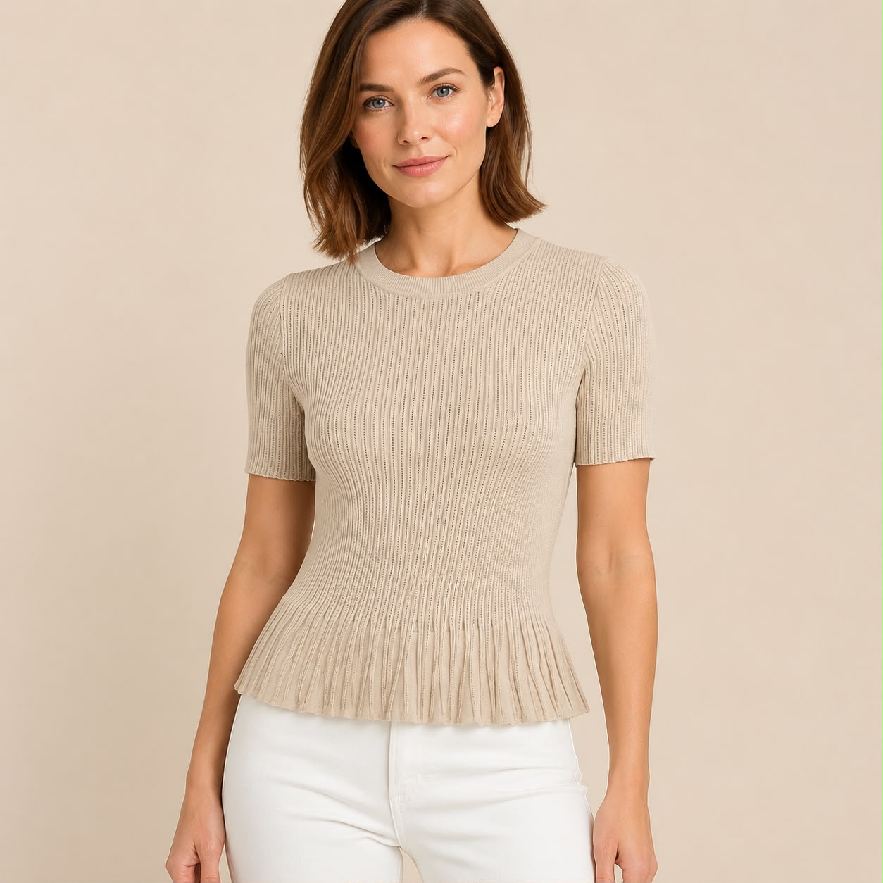 Top de punto cuello redondo version peplum plisado